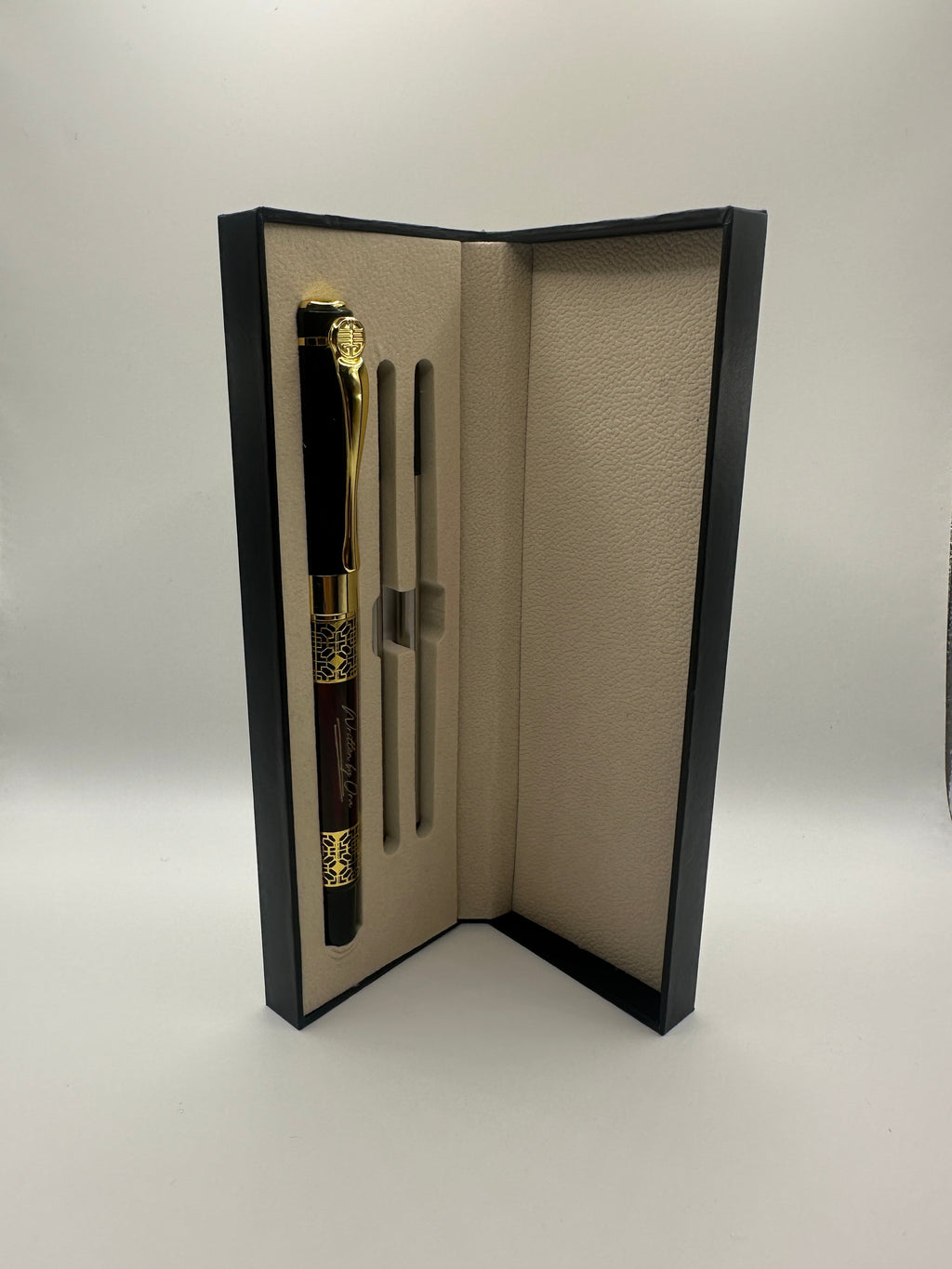Red Montblanc pen with two refills black ink