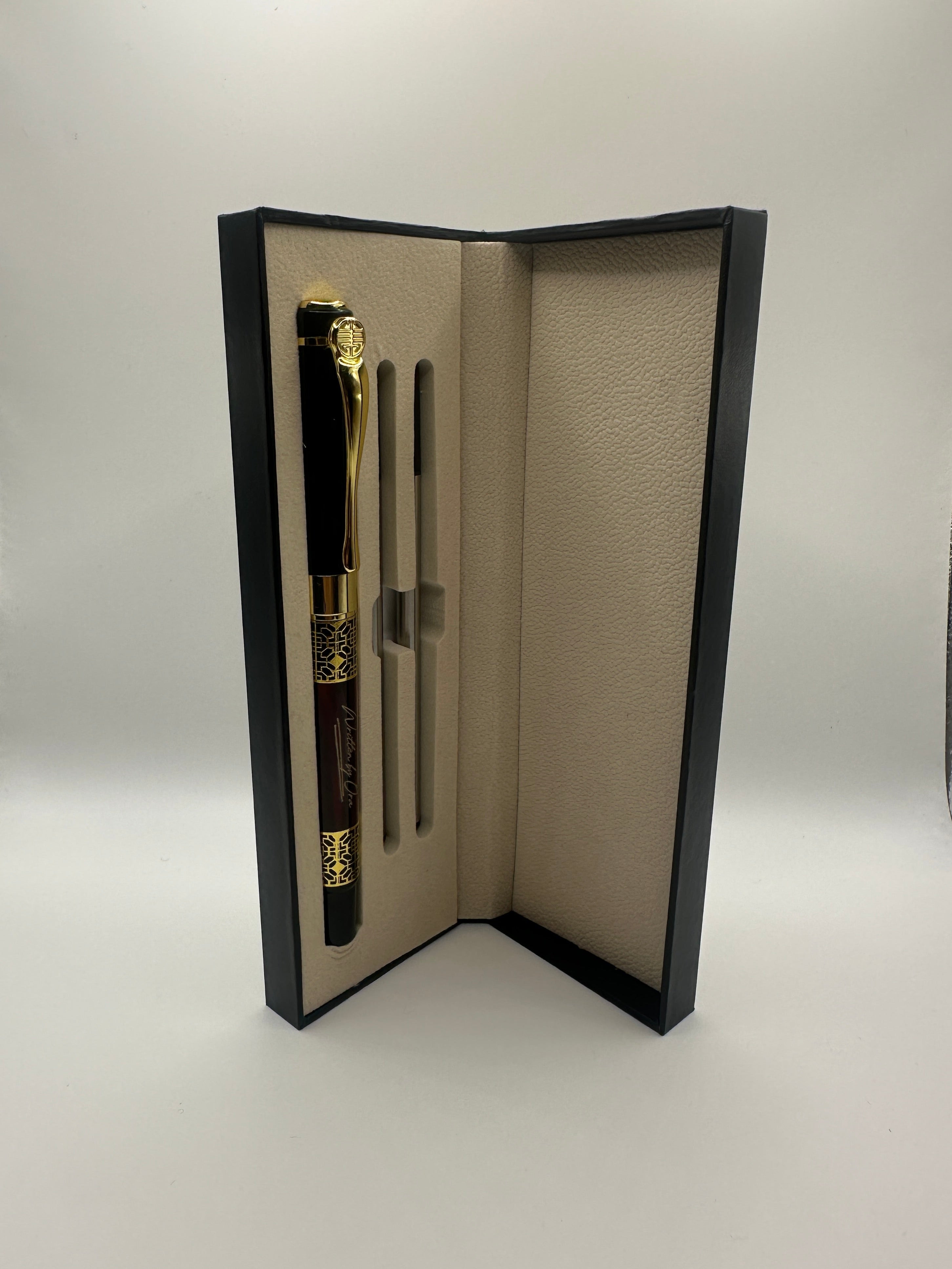 Red Montblanc pen with two refills black ink